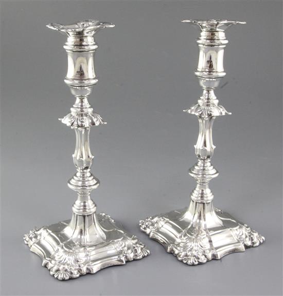 A pair of Edwardian silver candlesticks, Height 240mm, weighted.